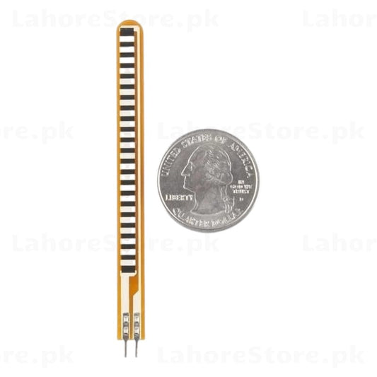 Single Spectra Symbol flex sensor next to a quarter coin for size reference