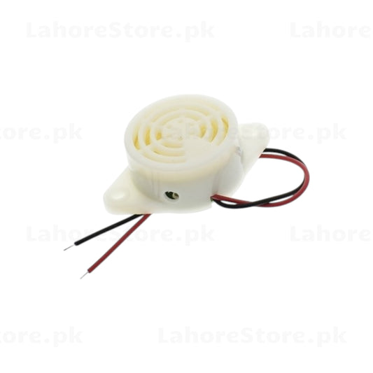 Active piezo buzzer side view showing flanged mounting base and wire leads