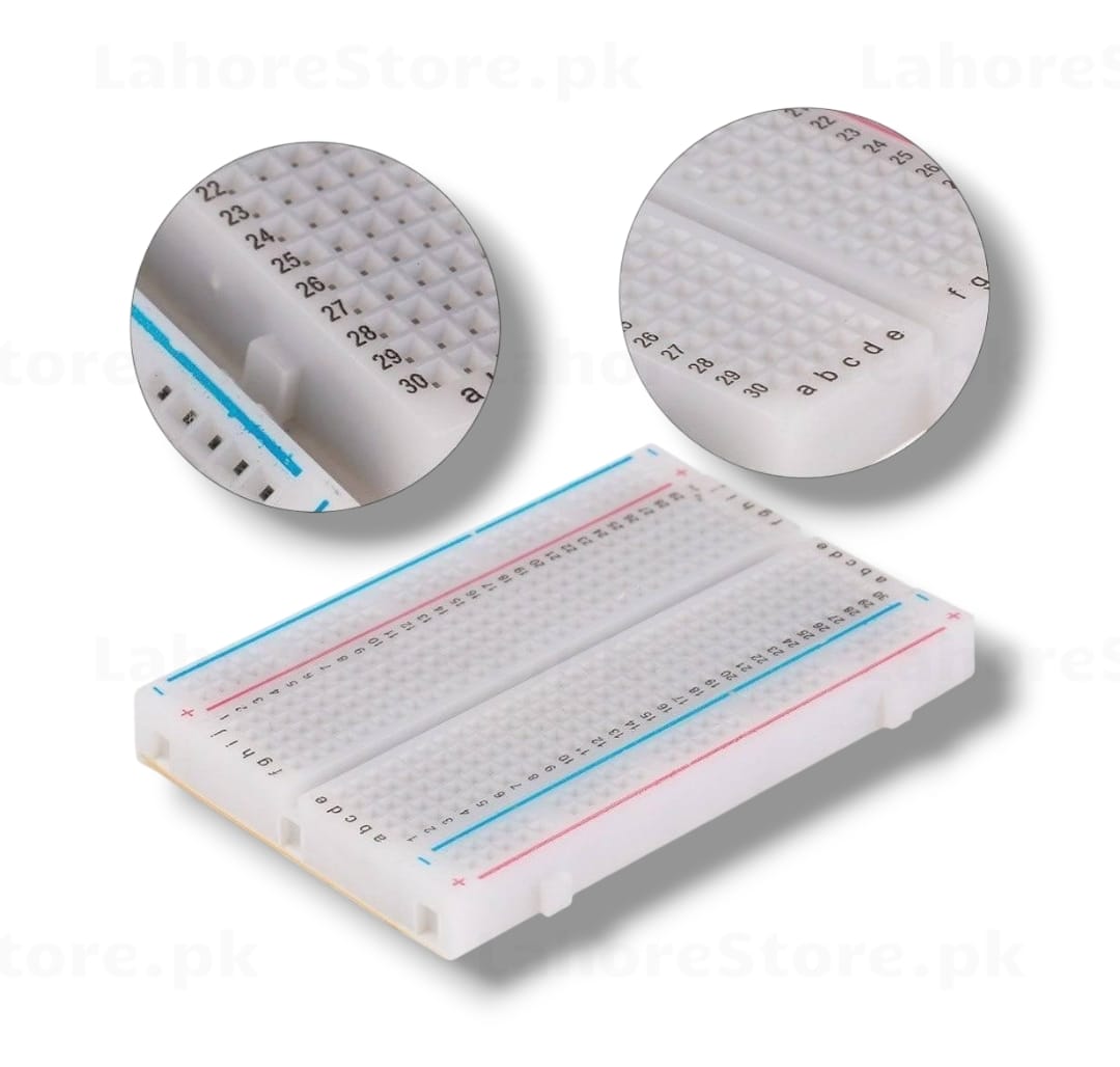 400-Point Solderless Breadboard held in hand showing size