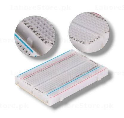 400-Point Solderless Breadboard held in hand showing size
