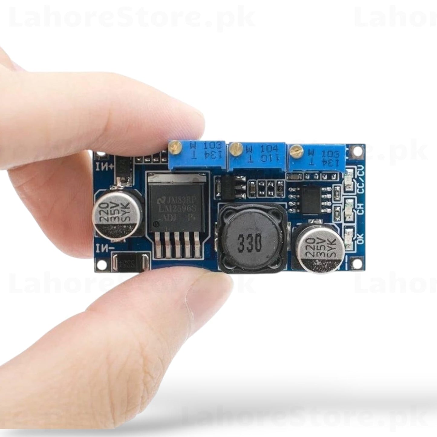 LM2596 DC-DC Buck Converter module held in hand
