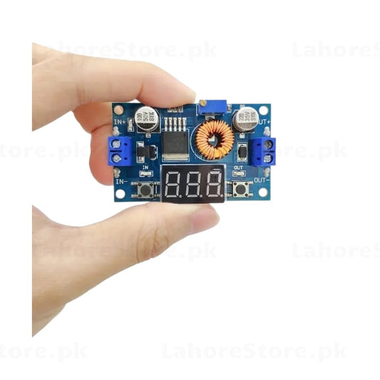 XL4015 buck converter module with heatsink and mounting hardware