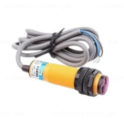 E18-D80NK infrared proximity sensor side view showing M18 threaded body adjustment potentiometer and 3-wire cable